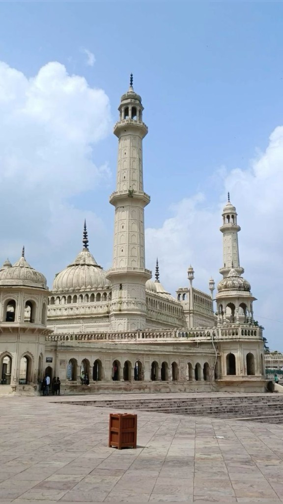 Historic mosque with domes and a tall minaret in Lucknow, Uttar Pradesh